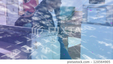 Image of financial data processing over man at the gas station Image of financial data processing over man at the gas station 128564905