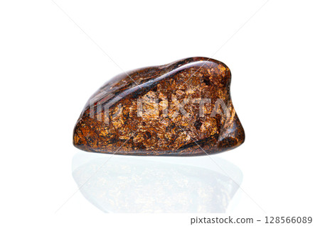 Bronzite gemstone on white background Bronzite gemstone on white background 128566089