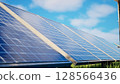 3D Renewable Energy Concept with Solar Panels in Nature 128566436