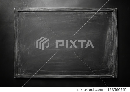 The grey chalkboard presents a blank surface ready for creative writing or drawing, perfect for classrooms or personal use The grey chalkboard presents a blank surface ready for creative writing or drawing, perfect for classrooms or personal use 128566761