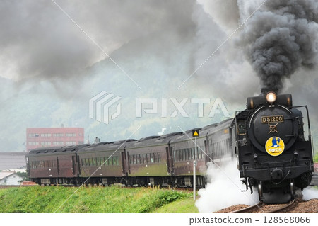 The steam locomotive "SL Yamaguchi" runs through the streets of Tsuwano The steam locomotive "SL Yamaguchi" runs through the streets of Tsuwano 128568066