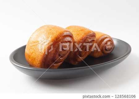 Fried Chinese Flower Buns on White Background Fried Chinese Flower Buns on White Background 128568106