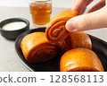 Traditional Fried Chinese Flower Bun with Wrinkled Texture 128568113