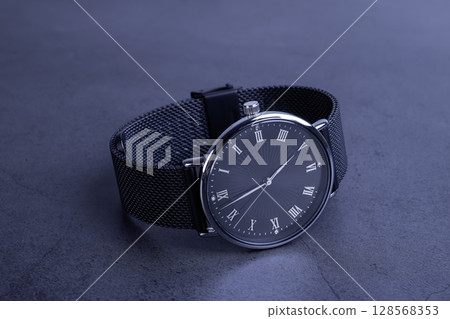 Wrist watch for women on gray background Wrist watch for women on gray background 128568353