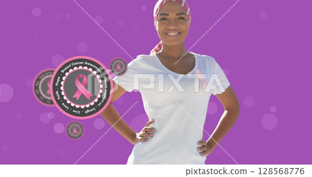 Image of breast cancer awareness text over biracial smiling woman Image of breast cancer awareness text over biracial smiling woman 128568776