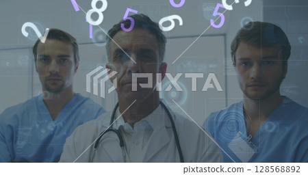 Image of numbers changing and scopes on screens over male doctors with stethoscope 128568892
