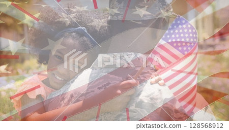 Image of flag of america blowing over smiling african american girl hugging soldier father Image of flag of america blowing over smiling african american girl hugging soldier father 128568912