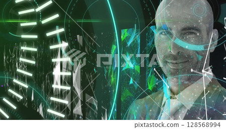 Image of scope scanning and data processing over smiling businessman 128568994