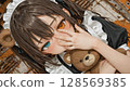 Unique Anime Girl Face with Heterochromia and Teddy Bear 128569385