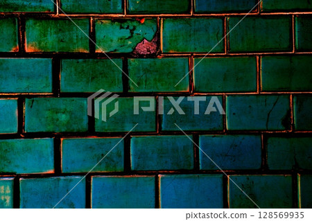 background texture of old cracked ceramic tiles, background in pastel colors. Changed color scheme. 128569935