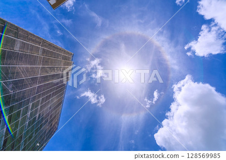 Yokohama cityscape in Japan. View of apartment building repairs and inspections, scaffolding, protective nets, halos, etc. Satellite antennas... 128569985