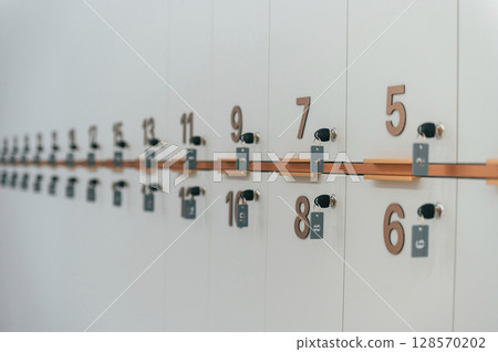 Close up view of lockers with keys and numbers Close up view of lockers with keys and numbers 128570202