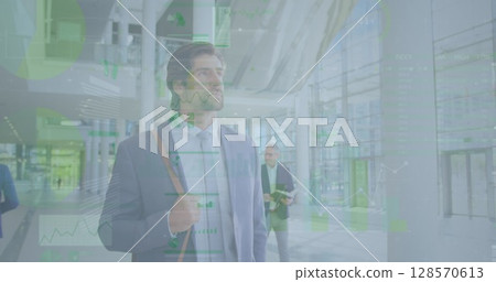 Image of statistic processing over businessman 128570613