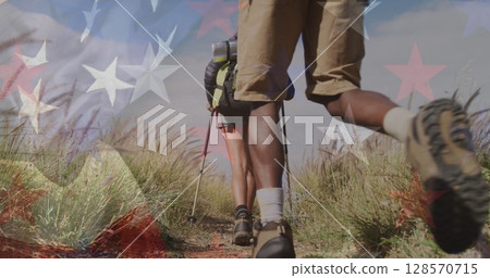 Image of flag of united states of america over people hiking in mountains Image of flag of united states of america over people hiking in mountains 128570715