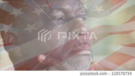 Image of flag of united states of america over portrait af senior african american man 128570734