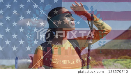Image of independence day text over biracial woman looking away in mountains Image of independence day text over biracial woman looking away in mountains 128570740