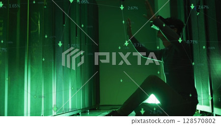 Image of data processing over caucasian female it engineer with vr headset by computer server Image of data processing over caucasian female it engineer with vr headset by computer server 128570802