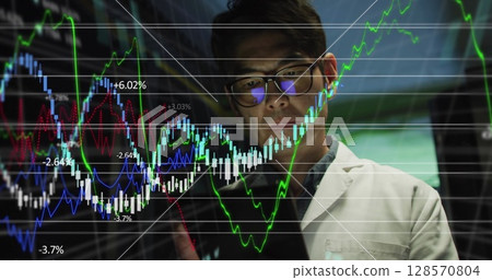 Image of statistics processing over asian male it engineer with tablet by computer server Image of statistics processing over asian male it engineer with tablet by computer server 128570804