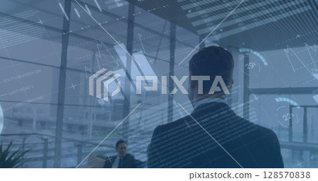 Image of statistics and data processing over businessman 128570838