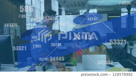 Image of financial statistics processing and numbers over business colleagues talking Image of financial statistics processing and numbers over business colleagues talking 128570992