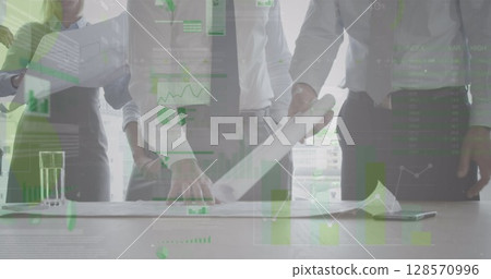 Image of statistics and financial data processing over business people in meeting Image of statistics and financial data processing over business people in meeting 128570996