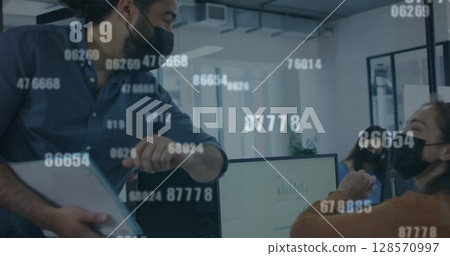Image of numbers processing over business people in face masks touching elbows in office Image of numbers processing over business people in face masks touching elbows in office 128570997