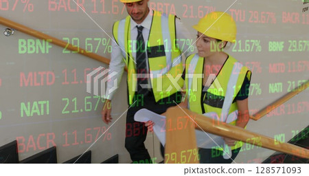 Image of statistics processing over female architect holding plans at construction site 128571093