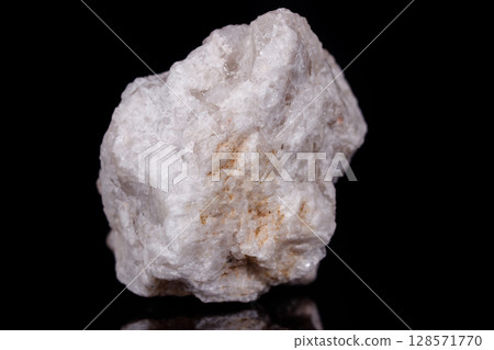 Macro mineral stone Albit on black background 128571770