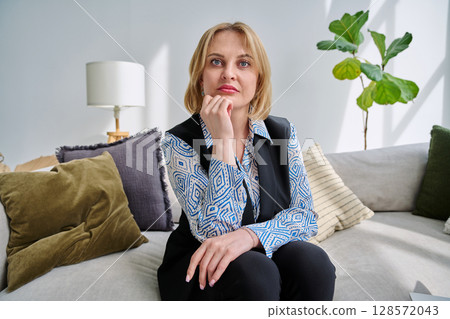 Webcam view middle aged businesswoman looking talking in camera 128572043