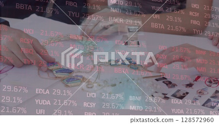 Image of financial data processing over business colleagues choosing jewelry in meeting Image of financial data processing over business colleagues choosing jewelry in meeting 128572960