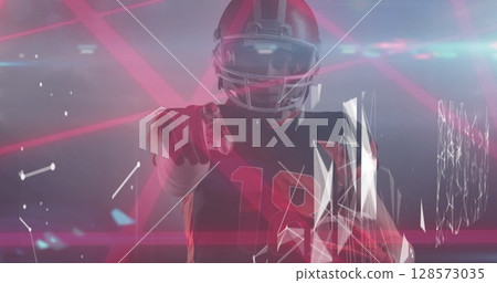 Image of digital interface over american football player Image of digital interface over american football player 128573035