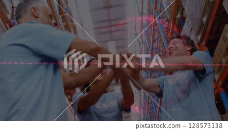 Image of financial data processing over diverse volunteers in warehouse Image of financial data processing over diverse volunteers in warehouse 128573138