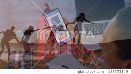 Image of caucasian woman using smartphone over female friends at beach Image of caucasian woman using smartphone over female friends at beach 128573149