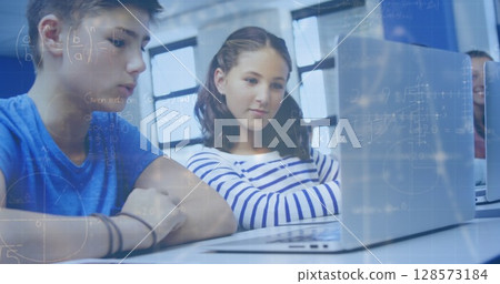 Image of mathematical formulas over students using computers Image of mathematical formulas over students using computers 128573184