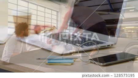 Image of laptop over group of business people in office 128573195