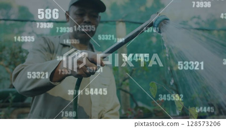 Image of numbers over african american worker watering plants 128573206