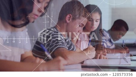 Image of mathematical equations over school children writing in classroom Image of mathematical equations over school children writing in classroom 128573356