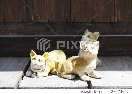 A cat ornament displayed on the veranda of an old house in the Iwami Ginzan Townscape District A cat ornament displayed on the veranda of an old house in the Iwami Ginzan Townscape District 128573642