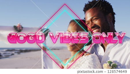 Image of good vibes only text with african american couple at beach Image of good vibes only text with african american couple at beach 128574649