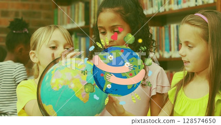 Image of globe icon over diverse schoolgirls with globe 128574650