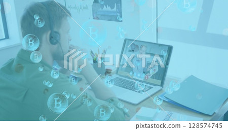 Image of bitcoins symbols over caucasian man on image call Image of bitcoins symbols over caucasian man on image call 128574745