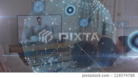 Image of data processing and globe over biracial family having image call on tv Image of data processing and globe over biracial family having image call on tv 128574786
