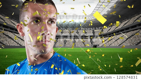 Golden confetti falling over caucasian male rugby player holding a rugby ball against sports stadium Golden confetti falling over caucasian male rugby player holding a rugby ball against sports stadium 128574831