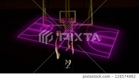 Neon basketball court layout against african american male basketball player practicing basketball Neon basketball court layout against african american male basketball player practicing basketball 128574862