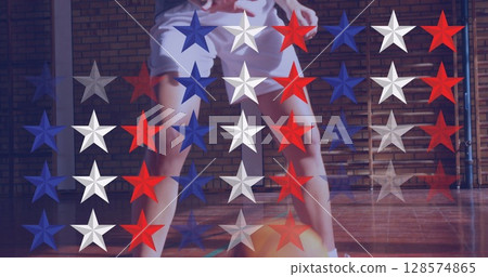 Star icons pattern design against caucasian female basketball player practicing basketball 128574865