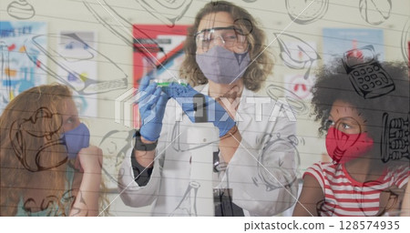 Image of school icons over diverse schoolchildren and teacher wearing face masks 128574935