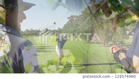 Image of trees over senior caucasian couple playing golf on golf course Image of trees over senior caucasian couple playing golf on golf course 128574960