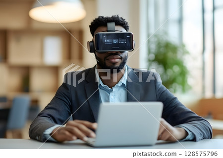 Employee using AR headset to access cloud files in office 128575796