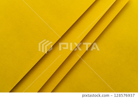 Overlapping yellow construction paper 128576937