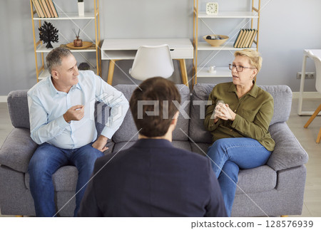 Elderly Couple In Therapy Session With Psychologist Elderly Couple In Therapy Session With Psychologist 128576939